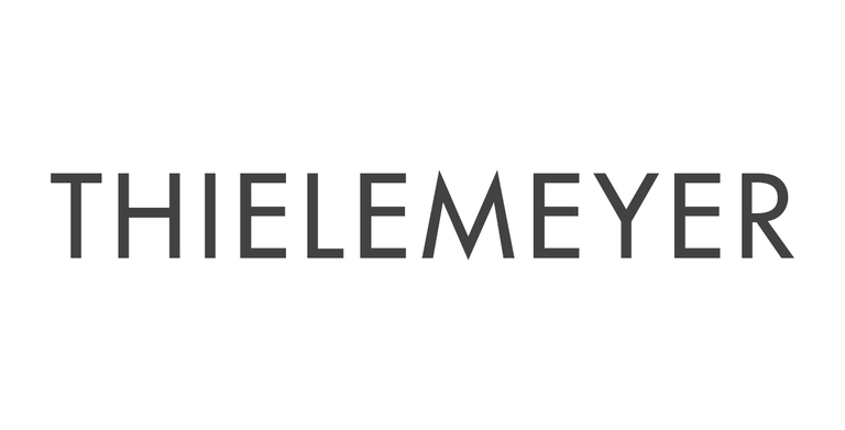 Weißes Bild mit Schriftzug "Miele"